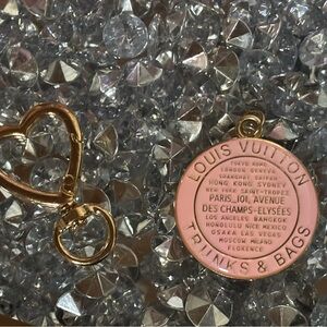 🩷💛… Louis Vuitton “Trunks and Bags”Pink and Gold Medallion with Keychain